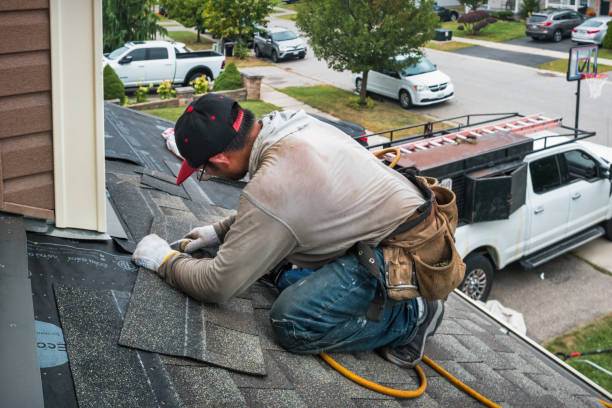 Professional Roofing technician working in State College, PA